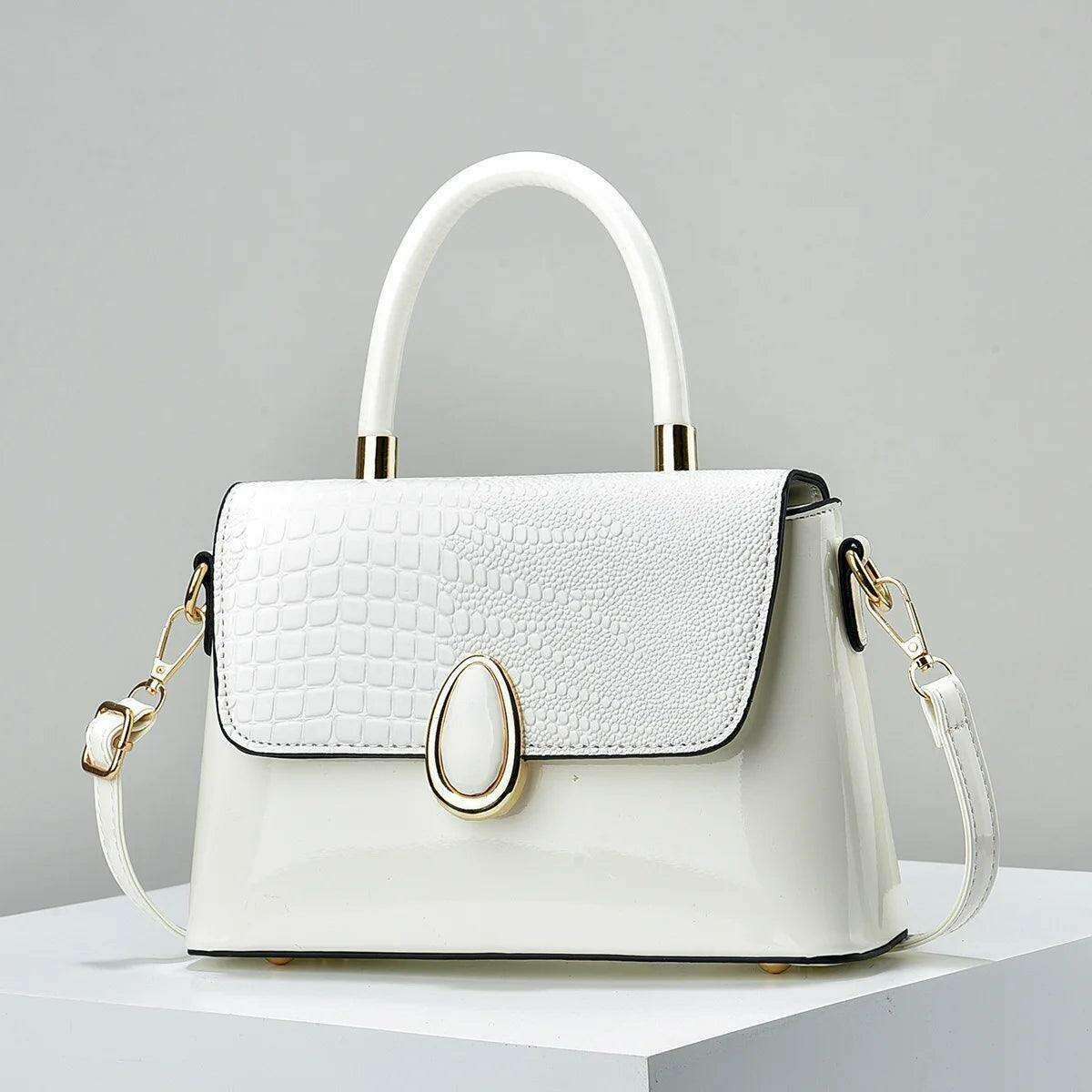 Shiny leather handbag with croco pattern