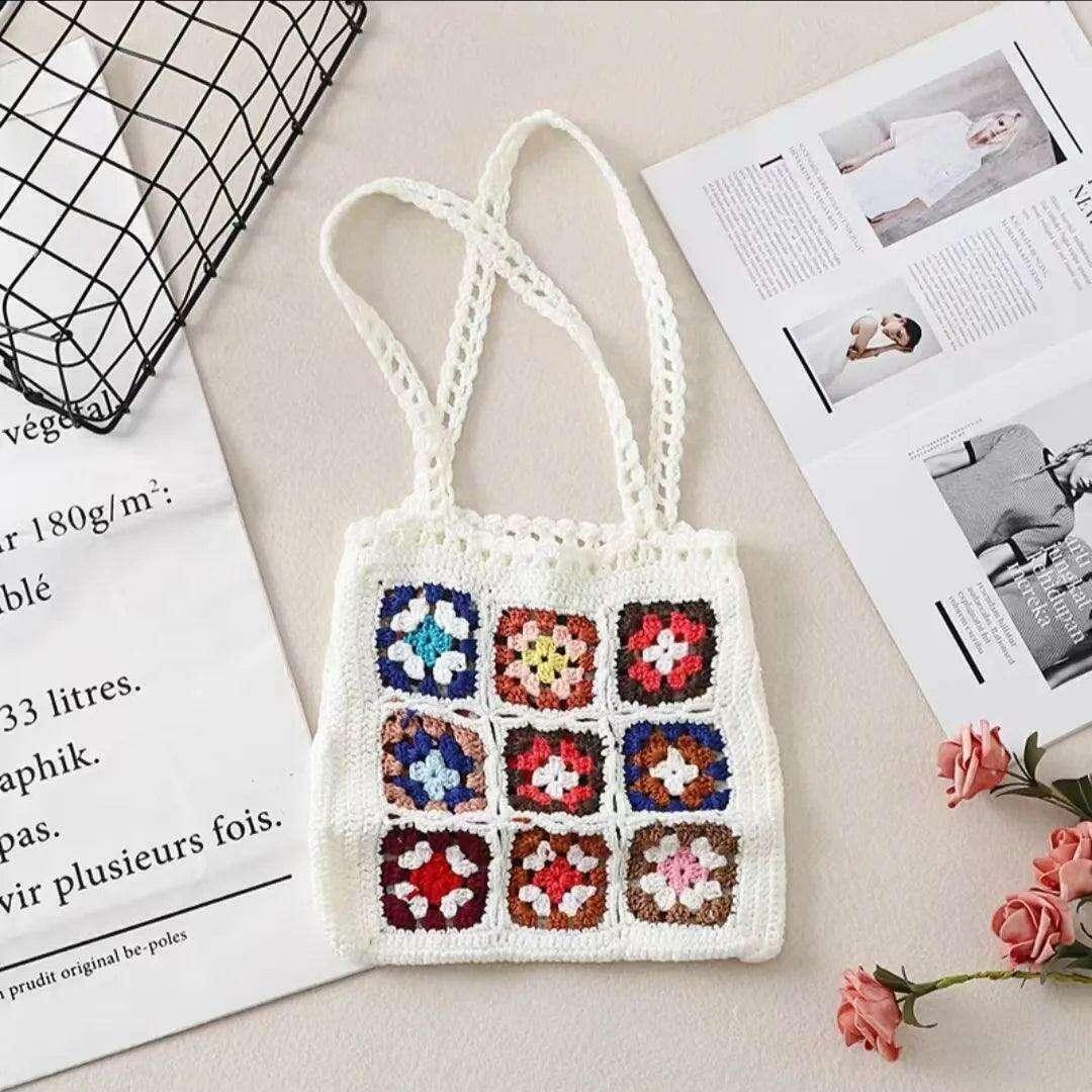 Knitted bag with a square floral design