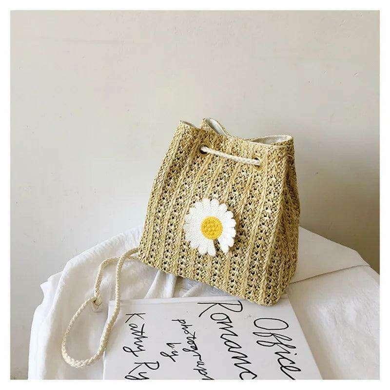 Women's knitted sack bag with floral decoration