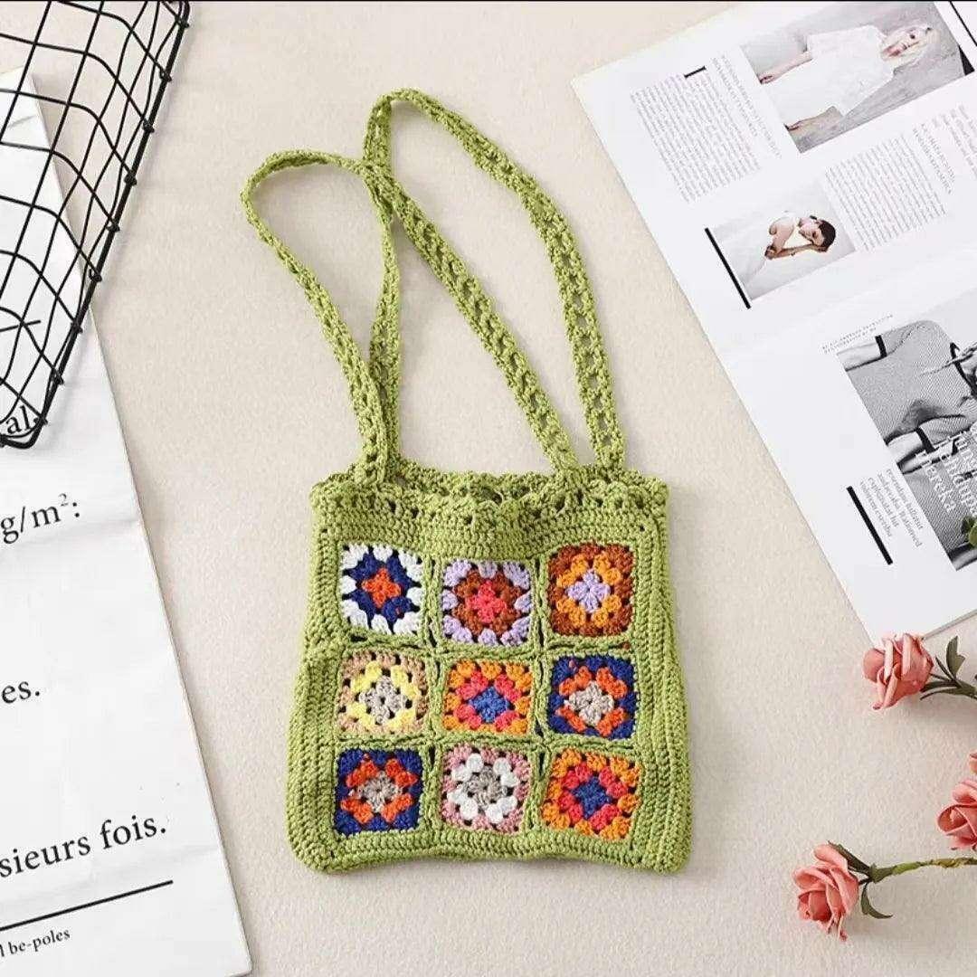 Knitted bag with a square floral design