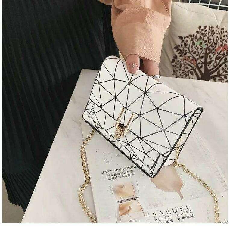 Women's evening bag with a glamorous geometric design