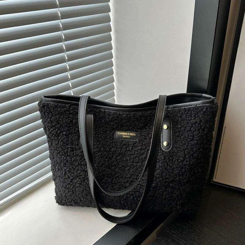 Women's brass shoulder bag - warmth and style for the winter season