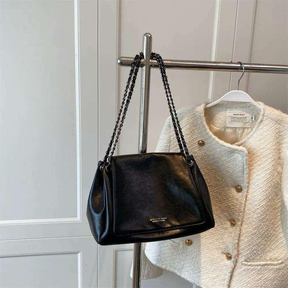 Women's crossbody bag with a designed chain strap