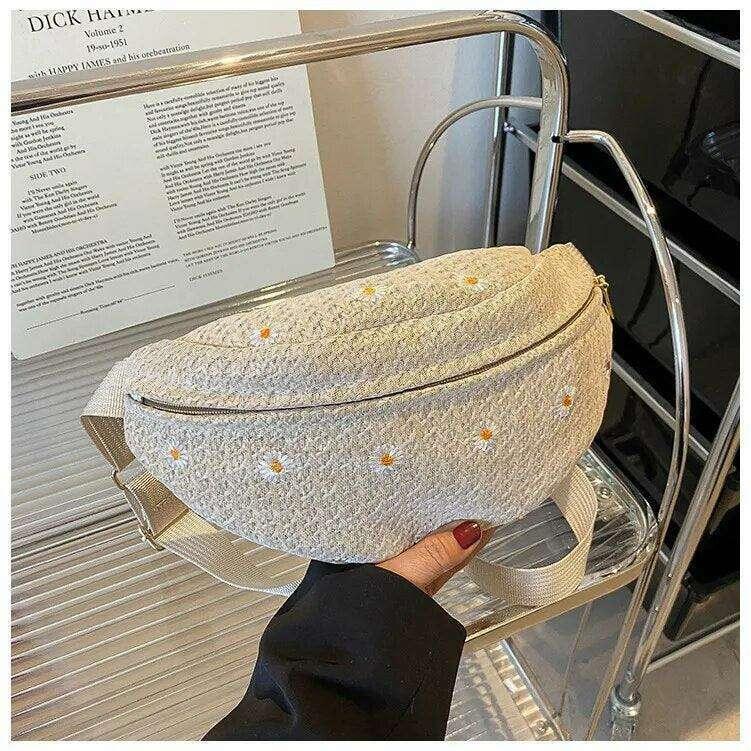 Knitted pouch bag with floral embroidery