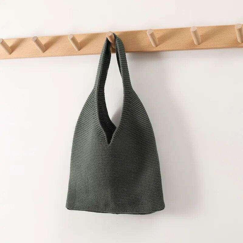 Knitted shoulder bag for women - classic and modern design