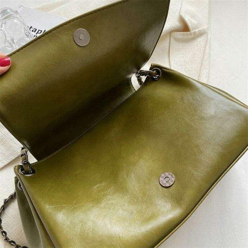 Women's crossbody bag with a designed chain strap