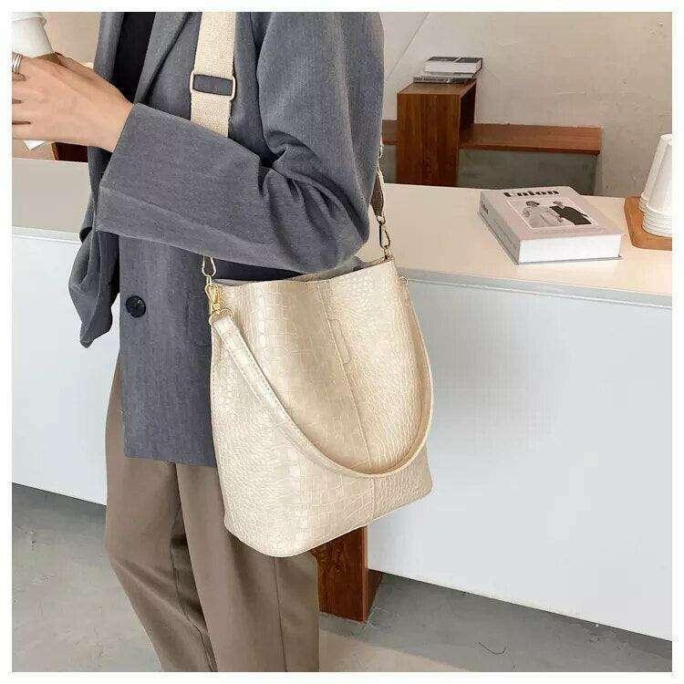 A fashionable shoulder bag with a unique look and crocodile texture