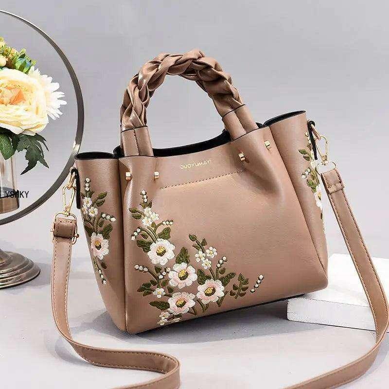 Embroidered handbag with floral pattern