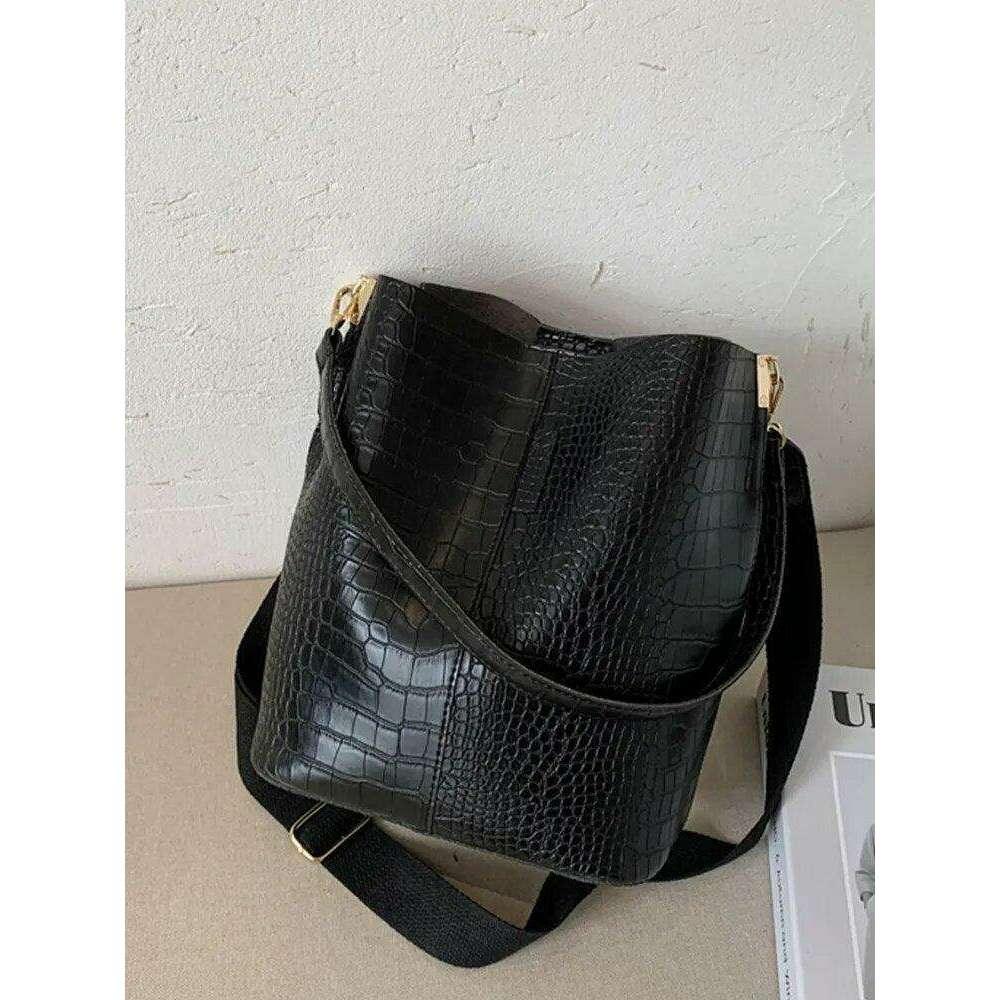 A fashionable shoulder bag with a unique look and crocodile texture