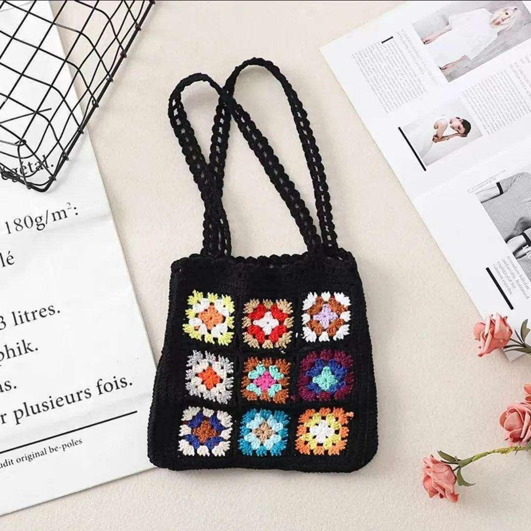 Knitted bag with a square floral design