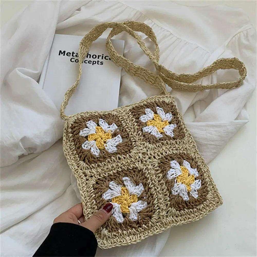 Knitted bag with a square floral design