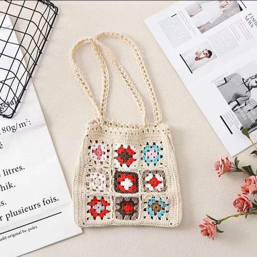 Knitted bag with a square floral design