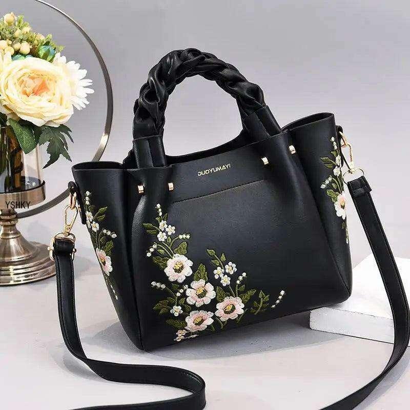 Embroidered handbag with floral pattern