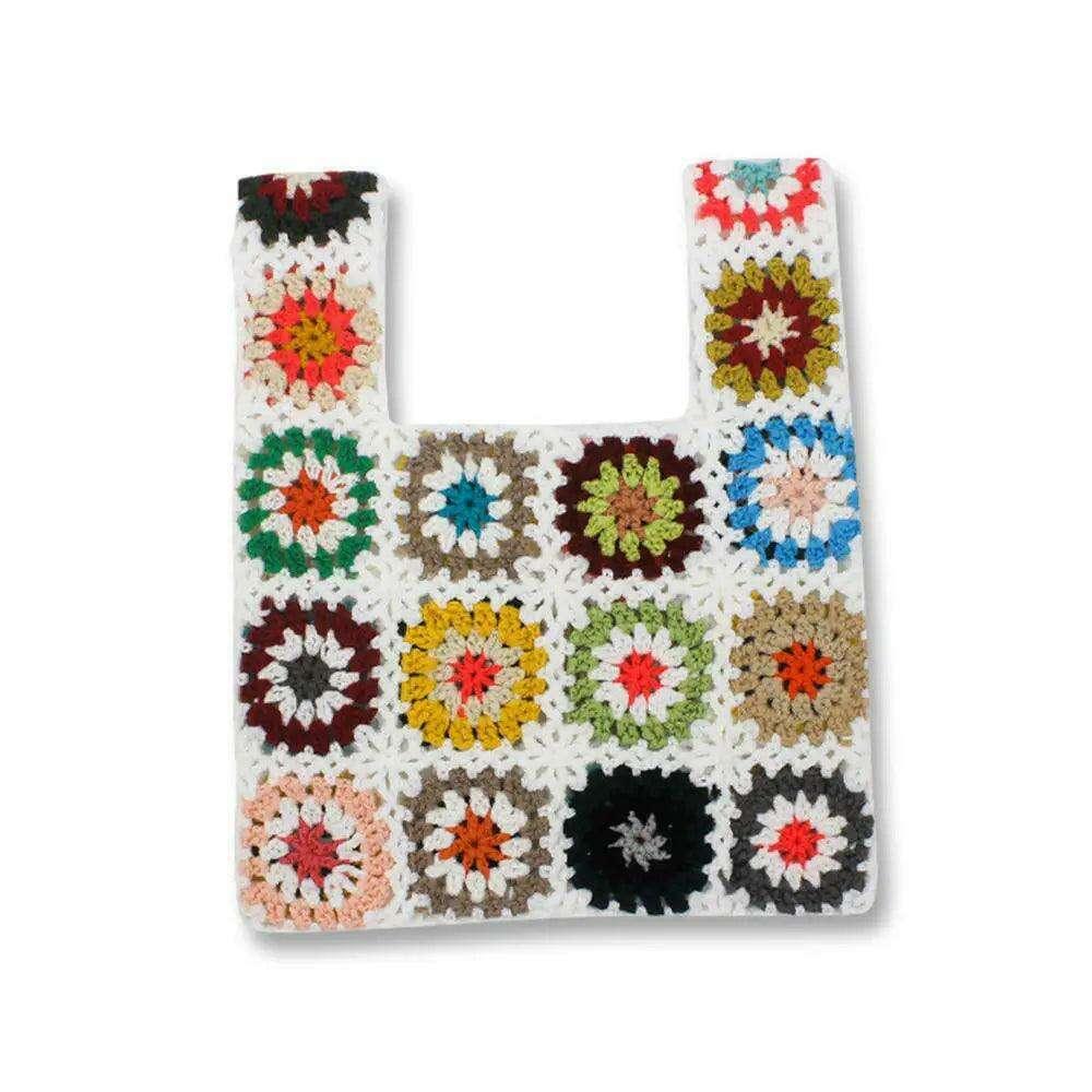 Knitted bag with a square floral design