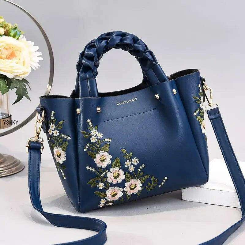 Embroidered handbag with floral pattern