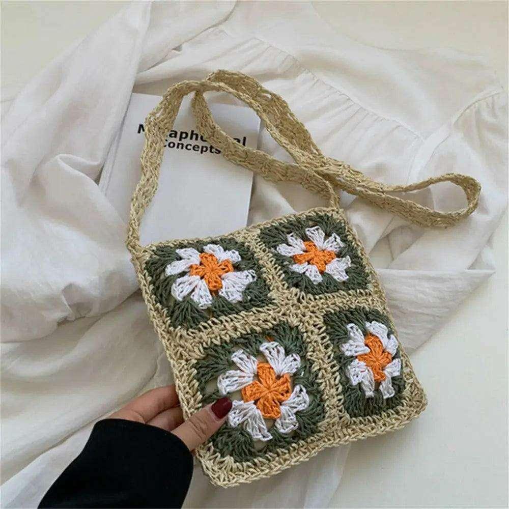 Knitted bag with a square floral design