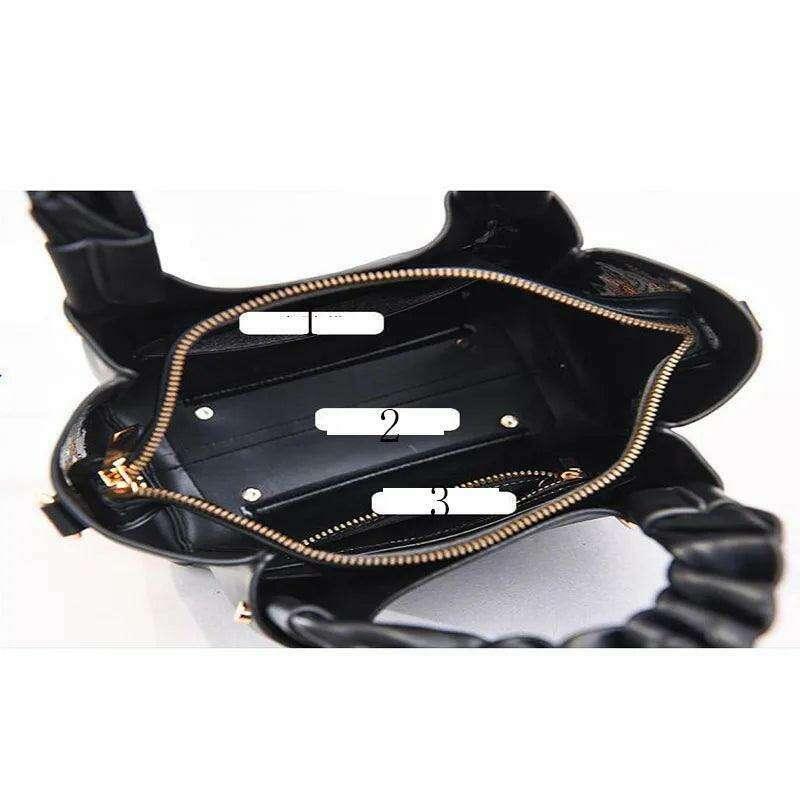 Embroidered handbag with floral pattern