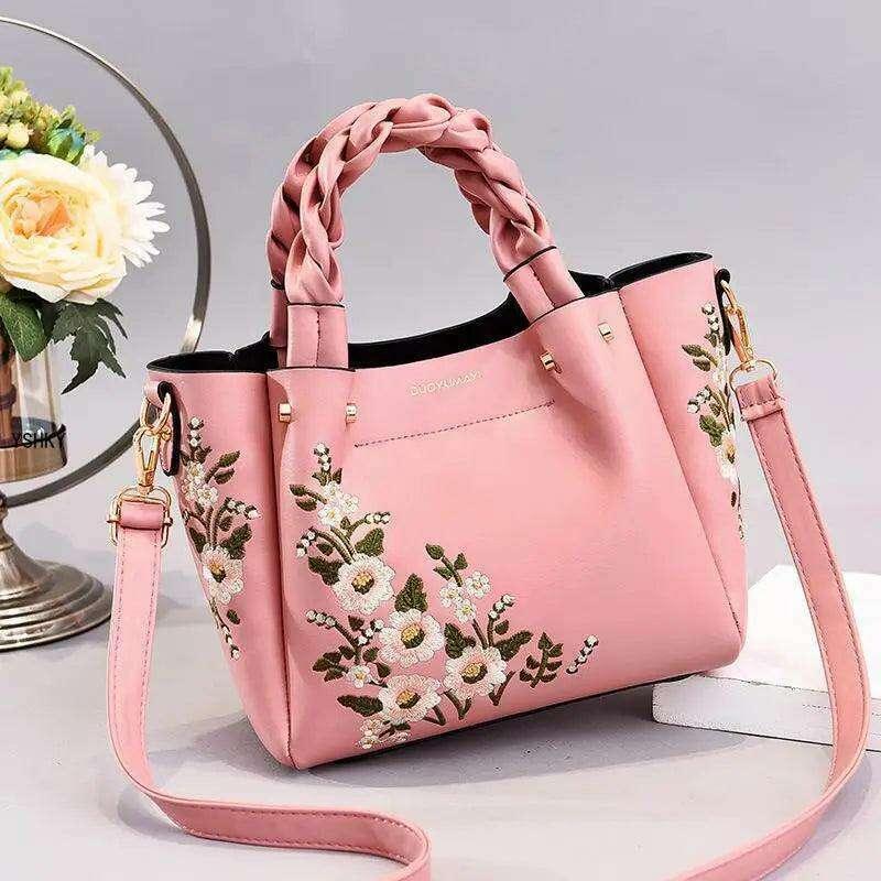 Embroidered handbag with floral pattern