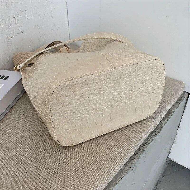 A fashionable shoulder bag with a unique look and crocodile texture