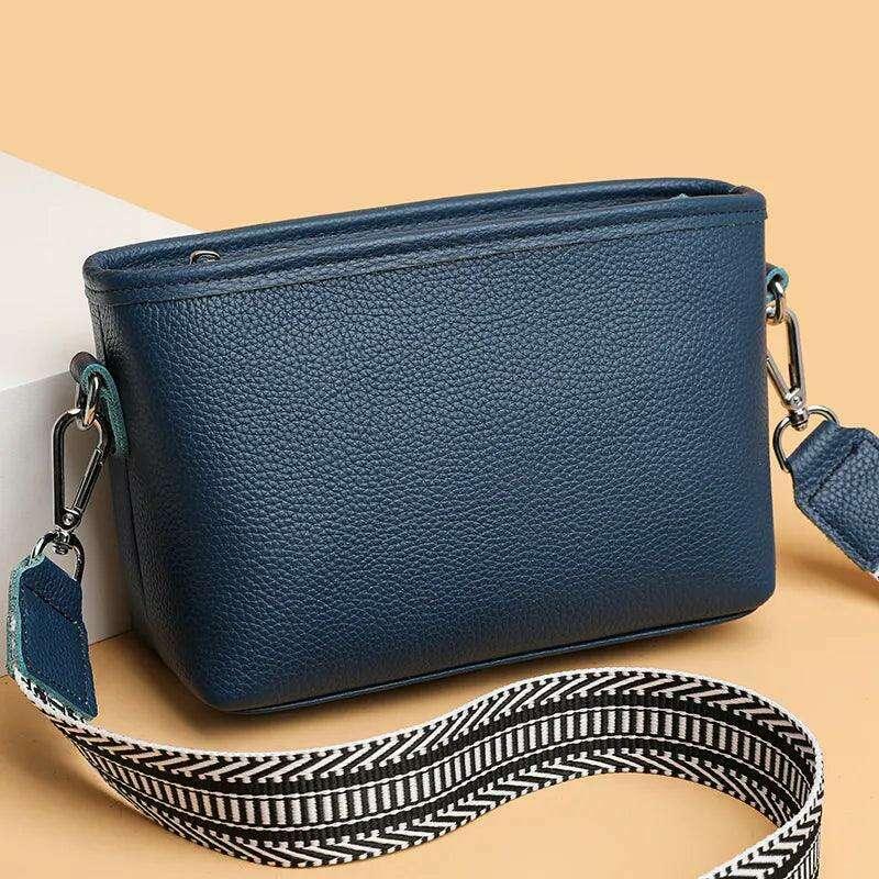 Small leather crossbody bag for women with a designed strap