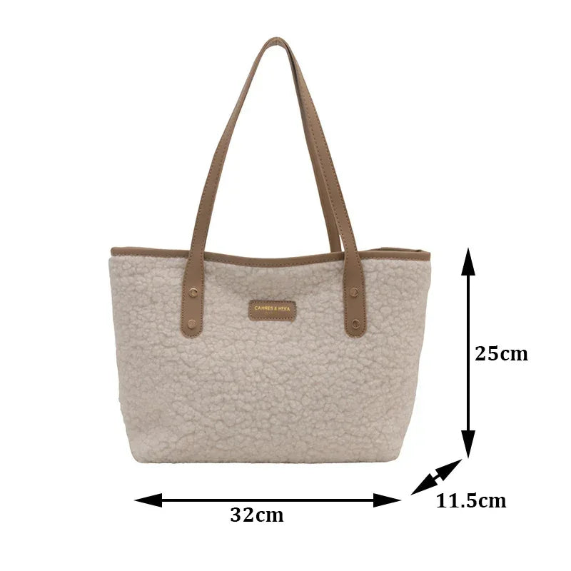 Women's brass shoulder bag - warmth and style for the winter season