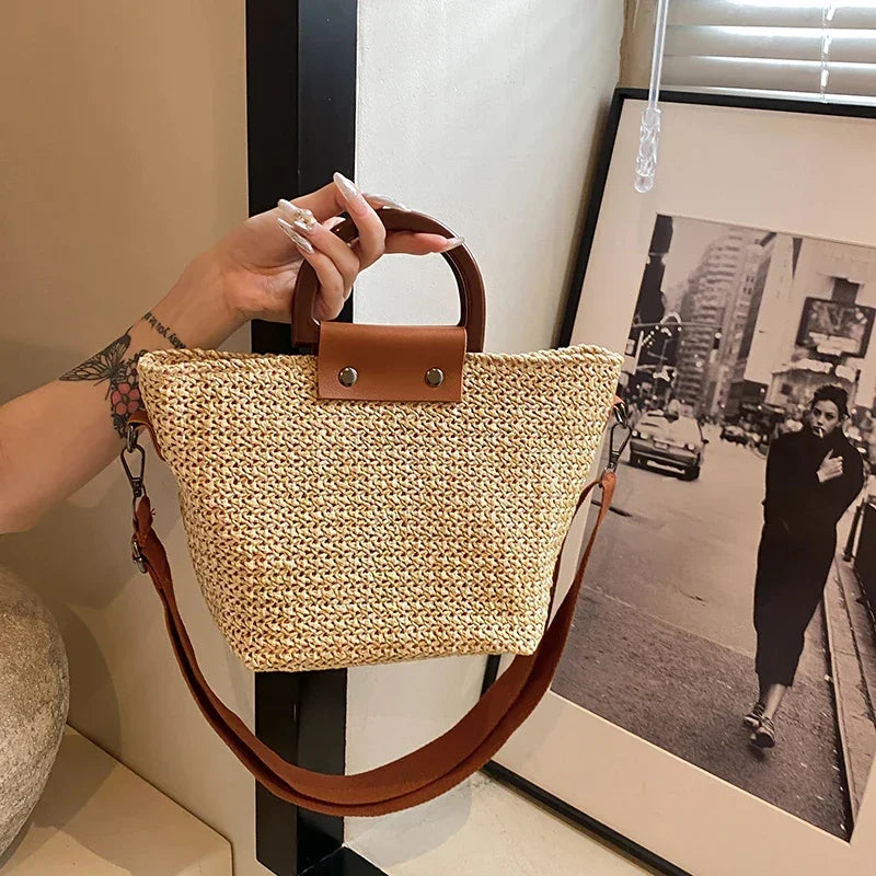 Large woven bag for women with round handle and padded shoulder strap