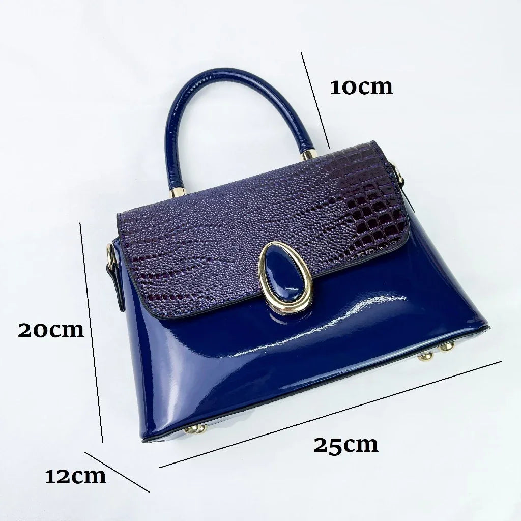 Shiny leather handbag with croco pattern